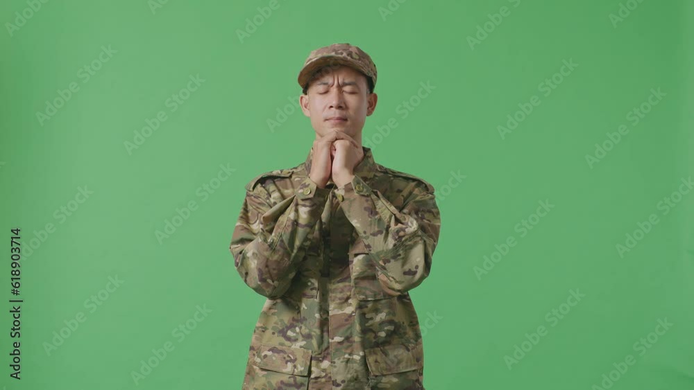 Asian Man Army Soldier Uniform Praying In The Green Screen Background Studio
Asian Man Army Soldier Uniform Praying In The Green Screen Background Studio