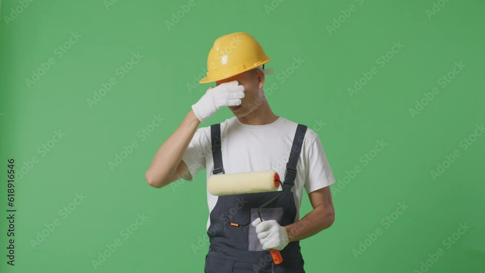 Asian Man Painter Wearing Safety Helmet Having A Headache While Standing In The Green Screen Background Studio
Asian Man Painter Wearing Safety Helmet Having A Headache While Standing In The Green Screen Background Studio