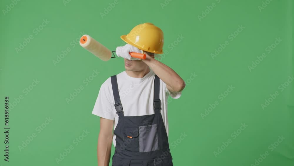 Asian Man Painter Wearing Safety Helmet Wiping The Sweat And Being Tired While Standing In The Green Screen Background Studio
Asian Man Painter Wearing Safety Helmet Wiping The Sweat And Being Tired While Standing In The Green Screen Background Studio