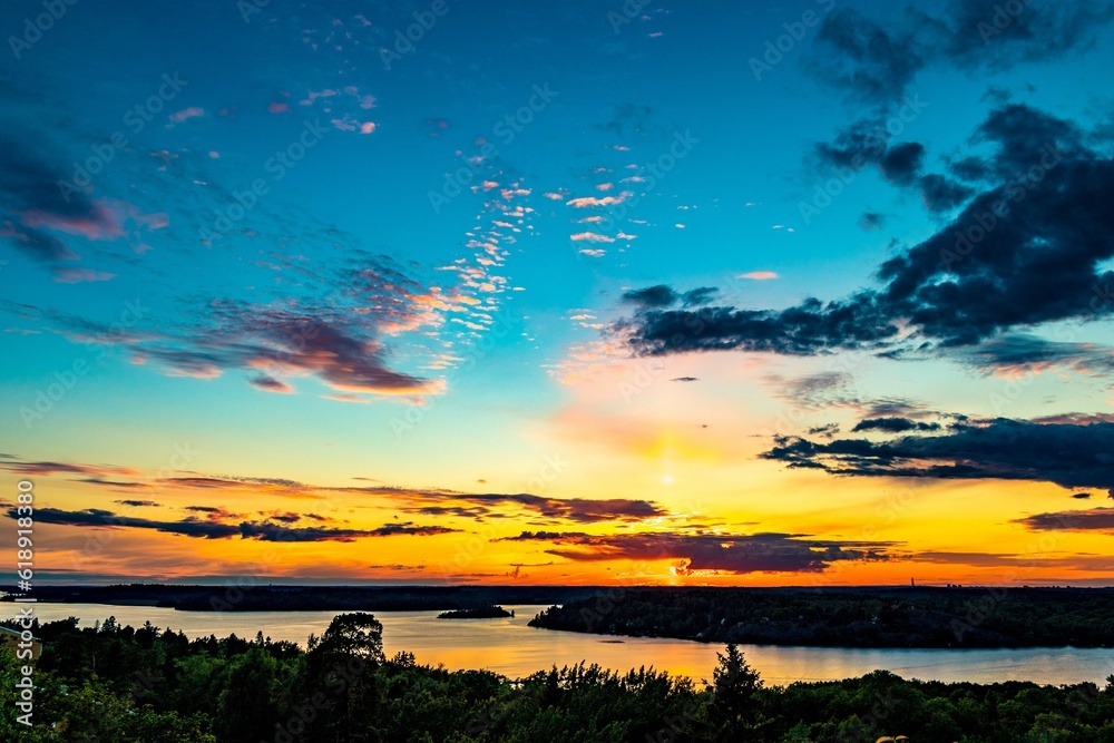 Obraz premium sunset over the river