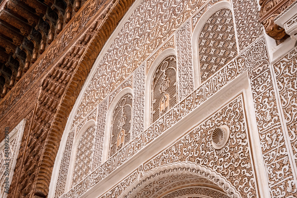 MARRAKECH, MOROCCO - APRIL 18, 2023 - Famous Madrassa Ben Youssef in the medina of Marrakech in Morocco
