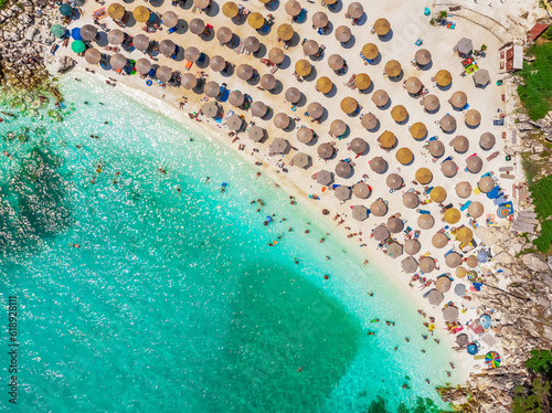 Beach with turquoise sea and umbrellas. Marble Beach, Thassos, Greece