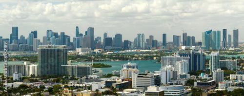 View from above of concrete and glass skyscraper buildings in downtown district of Miami Brickell in Florida, USA. American megapolis with business financial district on sunny day