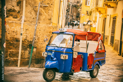 Fototapeta Naklejka Na Ścianę i Meble -  Tuk tuk car in streets of Sicily, Italy