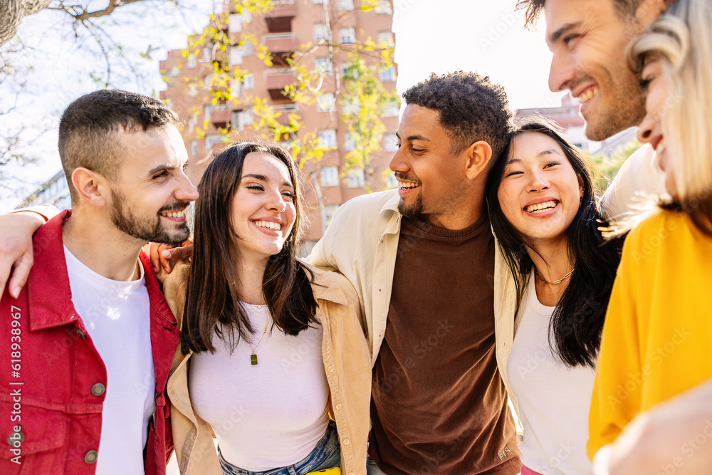 © Xavier Lorenzo - Young student friends group smile standing together outdoors. Diverse college people having fun enjoying funny moments in city street. Youth community and friendship concept. © Xavier Lorenzo - Young student friends group smile standing together outdoors. Diverse college people having fun enjoying funny moments in city street. Youth community and friendship concept.