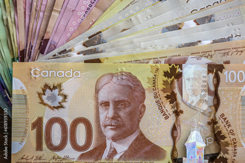 Canadian banknotes fanned out detail