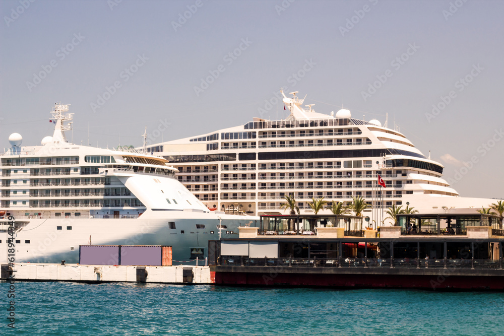 Large and luxury cruise ships are moored at port in Kusadasi of Turkey