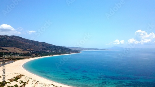 beautiful aerial view from the dunes from Valdevaqueros and a bay with turquoise blue water of the Atlantic Ocean, ,Tarifa, Andalusia, province of Cádiz, Spain, Travel, Tourism