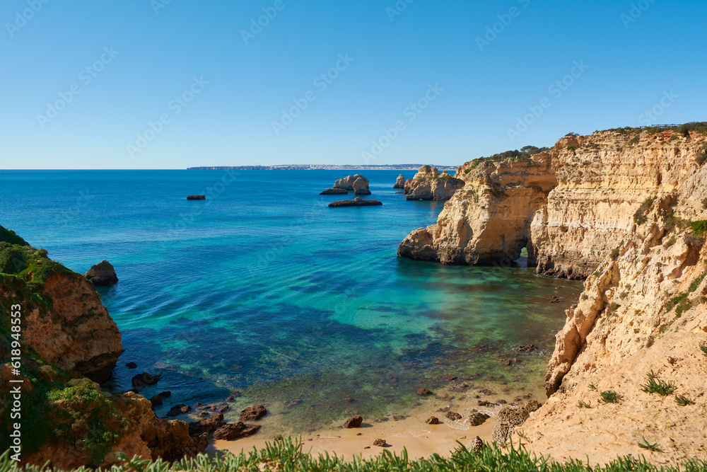 Solitary beach and lagoon close to Alvor. The hideaway place for the private beach holiday. Algarve, Portugal