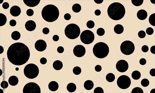 Abstract blue random polka dot circles seamless pattern on cream color background
