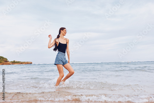 summer woman sea young person beach lifestyle travel running sunset smile