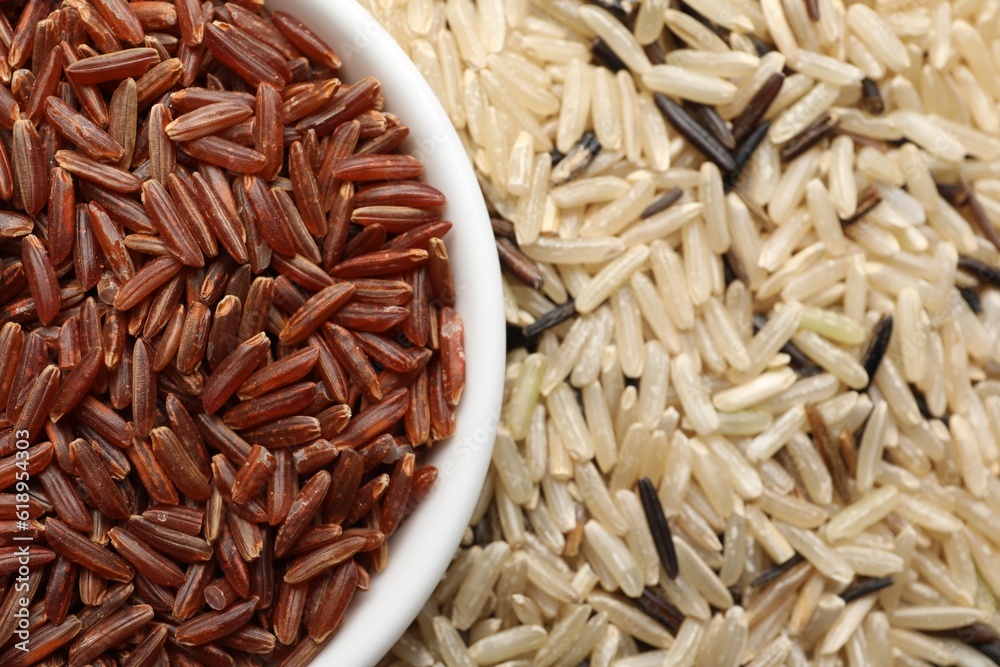 Different sorts of rice as background, closeup Different sorts of rice as background, closeup