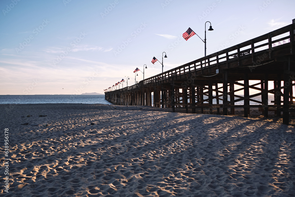 Ventura Pier, California with US flags for Thanksgiving Day.