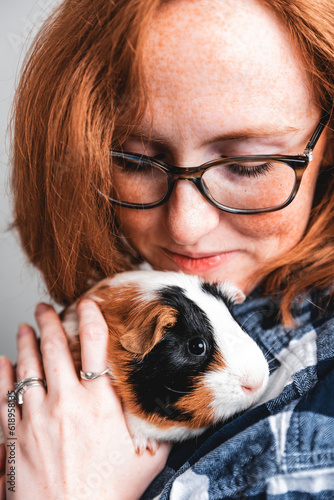 woman with a guinea pig