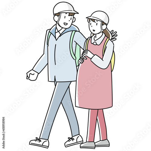 災害時に避難する妊婦と支援する男性