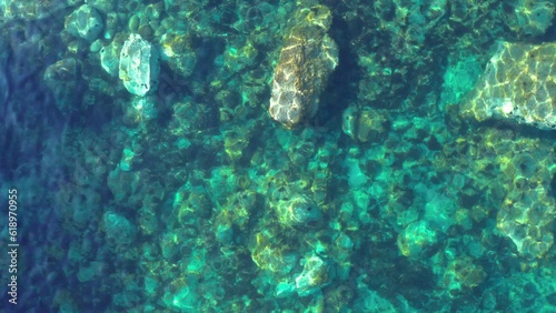 Fotografie Wide aerial footage of ligurian sea coast, transparent shallow turquoise water