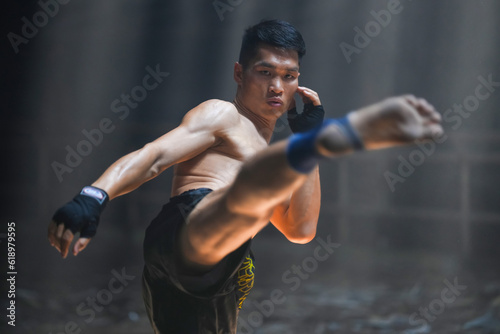 Muay Thai. Male boxers practicing Muay Thai. At a gym in Chiang Mai, Thailand © Surachai