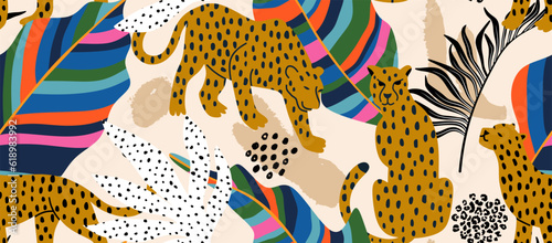 Leopard and tropical leaves seamless pattern.