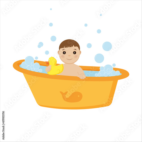 baby boy in the yellow bus with the duck