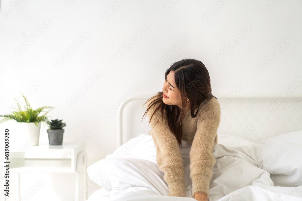 Portrait of smiling beauty pretty asian woman comfortable fresh healthy smile happy and relax in pajamas clothes, happy calm, resting, breathing fresh air.Girl felling wellbeing enjoy at home Portrait of smiling beauty pretty asian woman comfortable fresh healthy smile happy and relax in pajamas clothes, happy calm, resting, breathing fresh air.Girl felling wellbeing enjoy at home