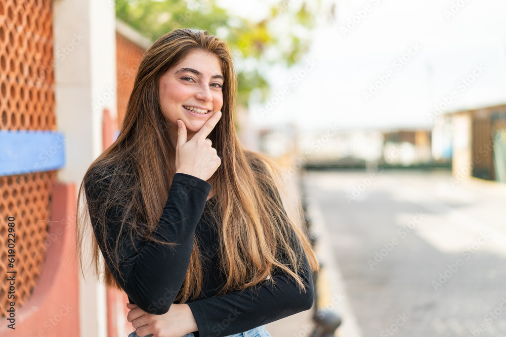 Young pretty caucasian woman smiling