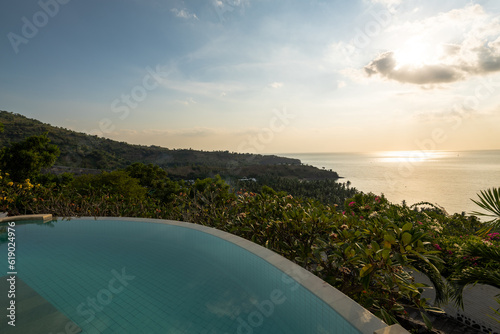 Luxury hotel infinity pool in summer © Michael