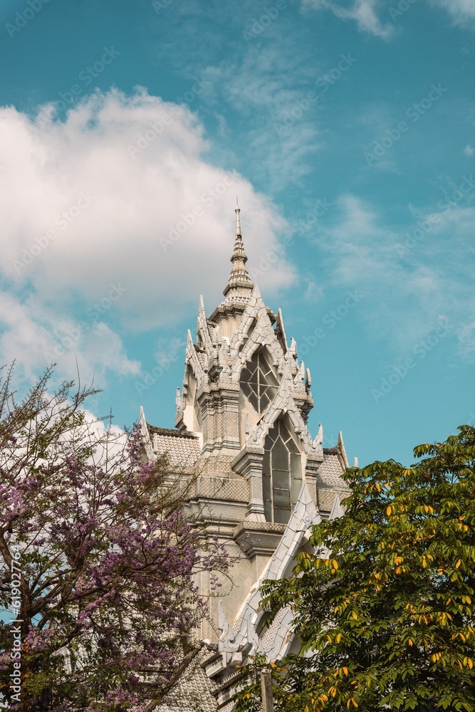 Vertical shot of a beautiful gothic-style church tower in Bangkok, Thailand