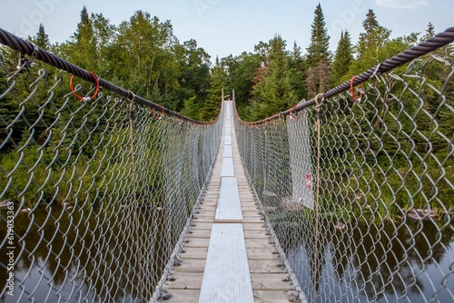 Iconic Pinawa Swinging Bridge in Pinawa, Manitoba, Canada photo
