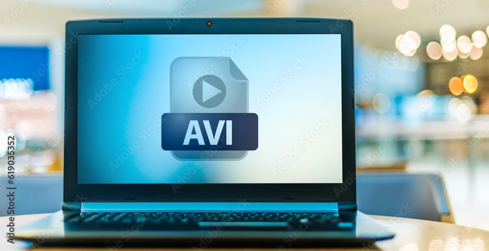 Laptop computer displaying the icon of AVI file Laptop computer displaying the icon of AVI file