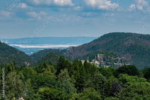 Scenic view of Zittauer-Gebirge mountain covered with greenery in Germany