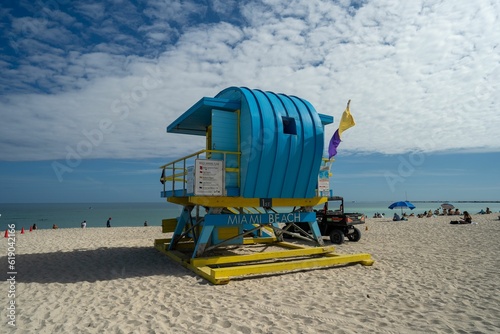 Iconic Miami Beach life guard house against the backdrop of a sunny, beachside sky © Pontix Productions/Wirestock Creators