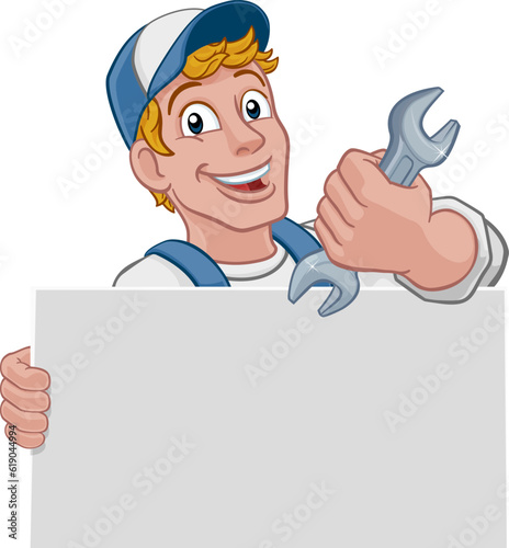 A handyman, mechanic, plumber or other construction cartoon mascot man holding a wrench or spanner tool.