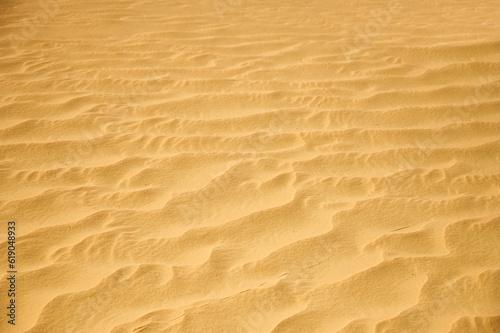 Near view of the sand of the beach or of the desert