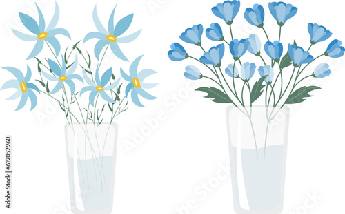 Set of blue flower bouquets, glass vase with meadow flowers, flower gift.