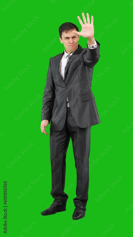Businessman showing stop gesture. Chroma key, full body Businessman showing stop gesture. Chroma key, full body