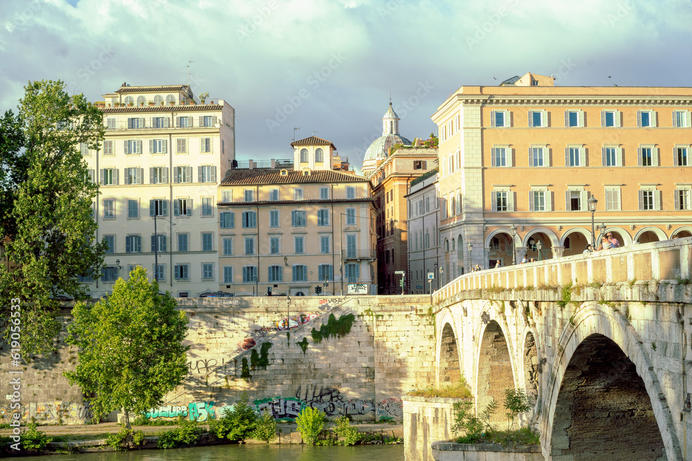 Fototapeta premium view of buildings and a bridge in Italy