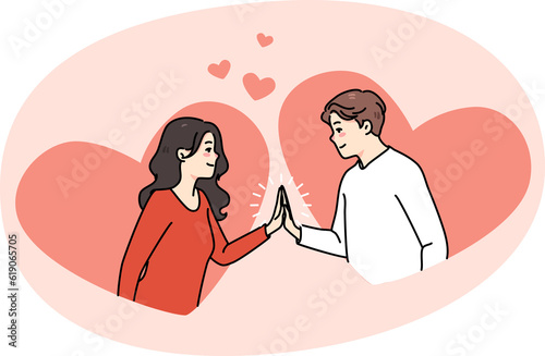 Happy man and woman touch hands have close moment