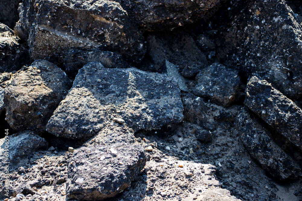 close up of a pile of dug up used tarmac