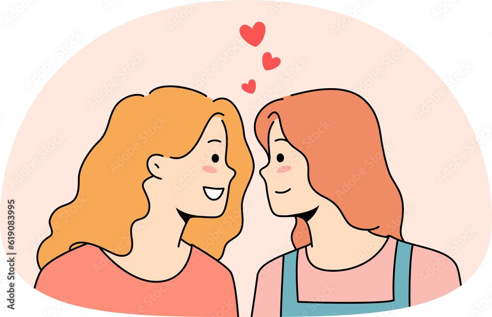 Happy lesbian women look in eyes show love Happy lesbian women look in eyes show love