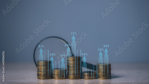 Stacking coins different height for interest rates from different investment, financial investment business stock growth. copy space.