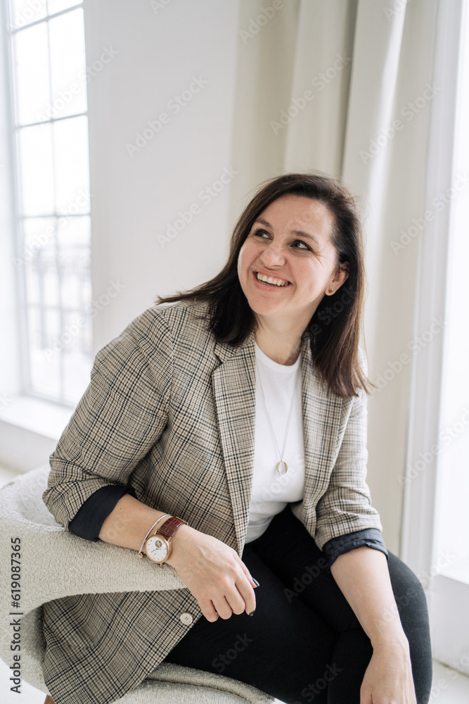 Career as a psychologist, sitting in a chair office day workplace, cheerful smart manager woman, freelancer working at home. Career as a psychologist, sitting in a chair office day workplace, cheerful smart manager woman, freelancer working at home.