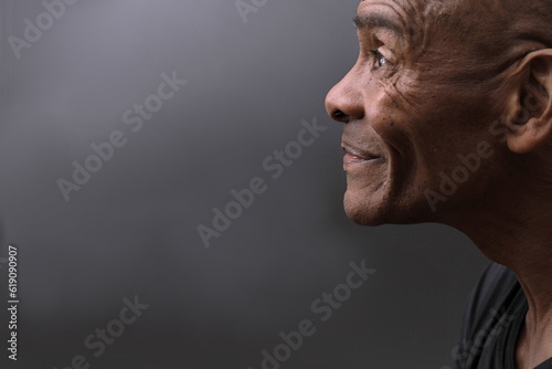 man praying to god Caribbean man praying with black grey background with people stock photo © herlanzer