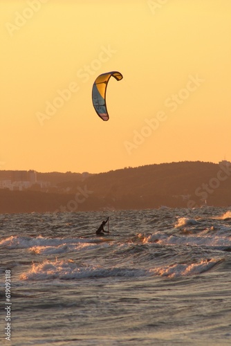 Canvas Print kite surfing at sunset