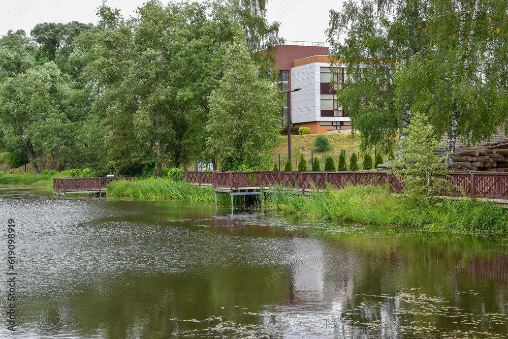 Nature paek in the city with flowers and wooden boardwalks Nature paek in the city with flowers and wooden boardwalks