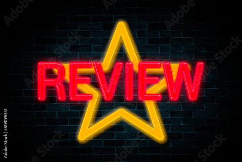 Review with star symbol the neon banner on the brick wall background.