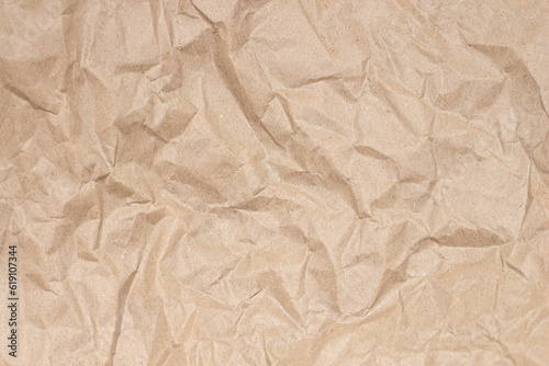 Brown sheet crumpled paper texture background and box.
