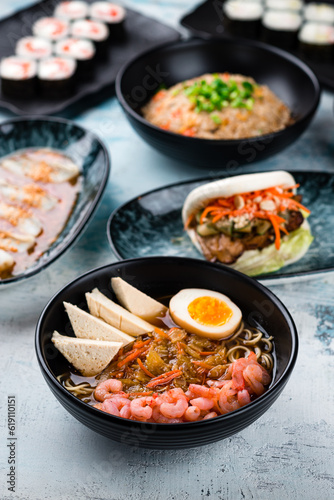 Dashi broth, rice with chicken, flatbread with beef and sushi maki rolls.