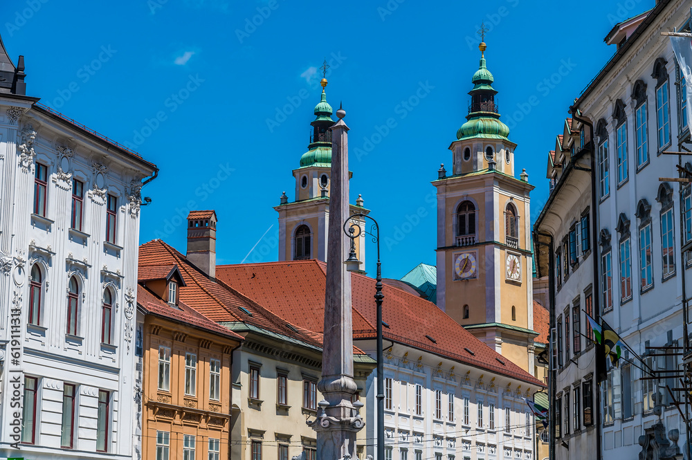 A view of Baroque buildings beside the River Ljubljanica in Ljubljana, Slovenia in summertime