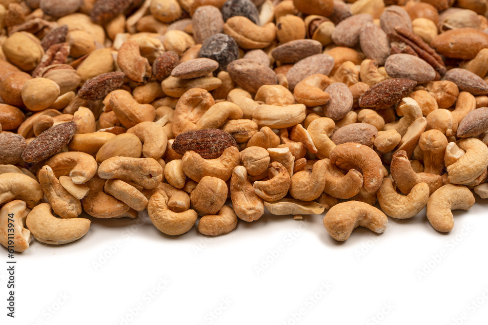 A group of almonds, pistachios, walnuts, macadamia, cashews. A group of almonds, pistachios, walnuts, macadamia, cashews.