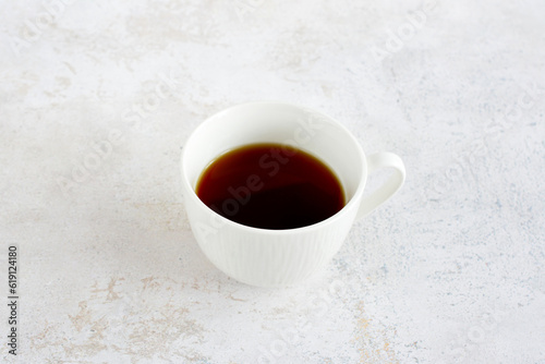 cup of chicory tea isolated on gray background, close up 